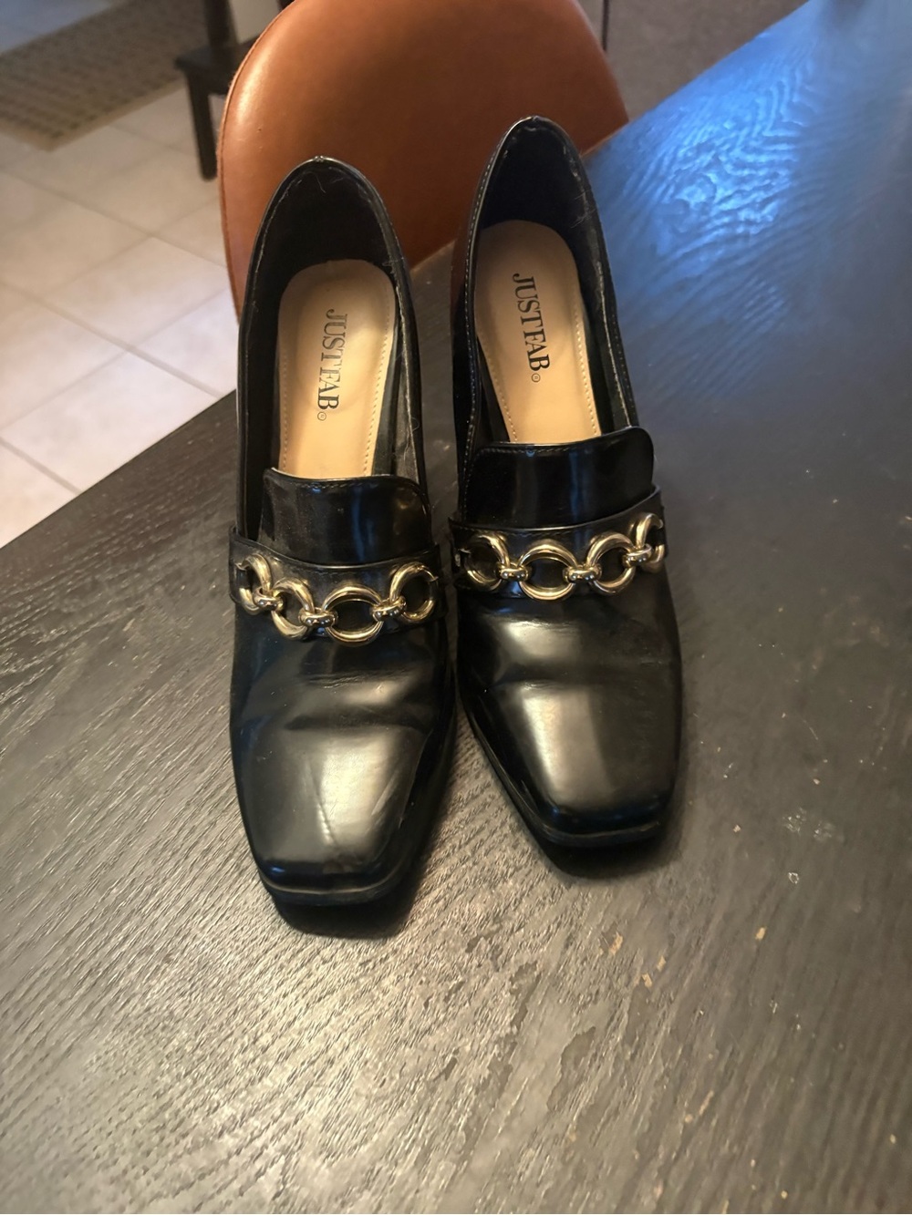 JustFab Black Leather Loafers with Gold Chain Accent